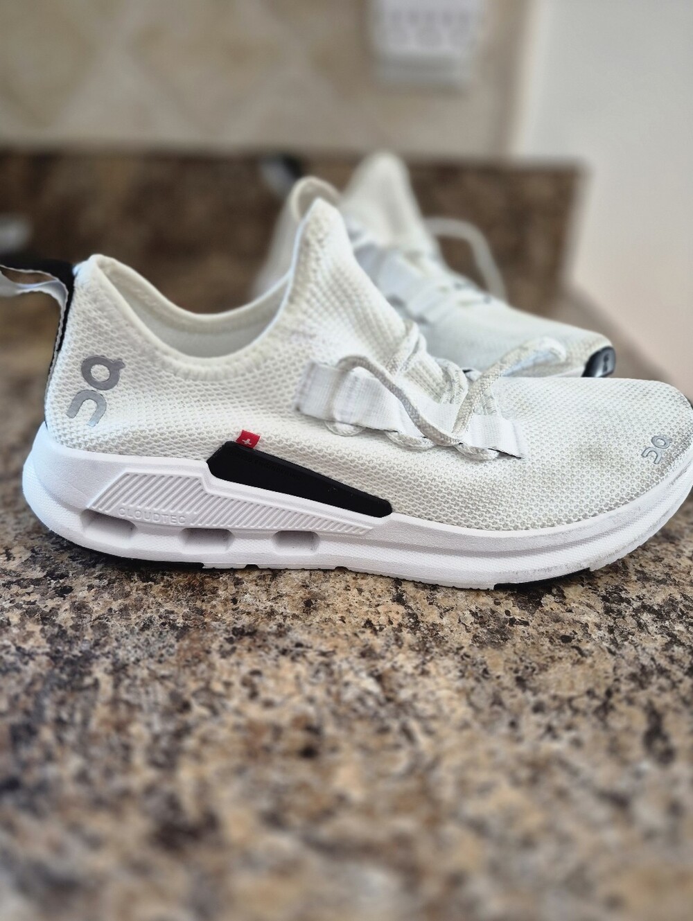 On Running Women’s White Athletic Slip-On Sneakers with Black Accent